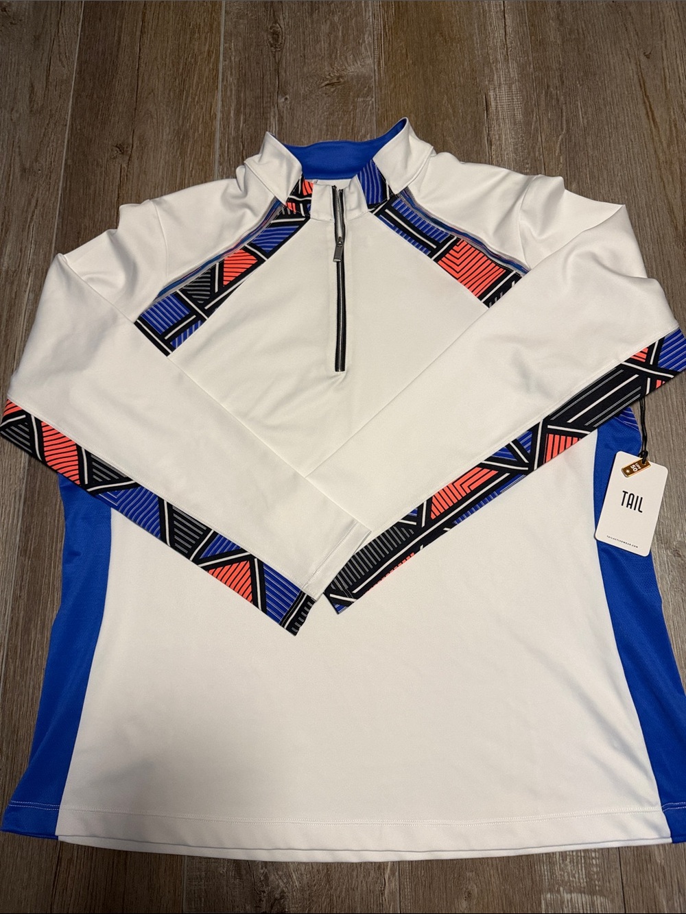 TAIL UPF 50 White Pullover with Blue Panels and Black-Coral Geometric Trim